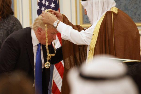 Saudi King Salman presents President Donald Trump with The Collar of Abdulaziz Al Saud Medal at the Royal Court Palace, Saturday, May 20, 2017, in Riyadh. (Evan Vucci/Associated Press)