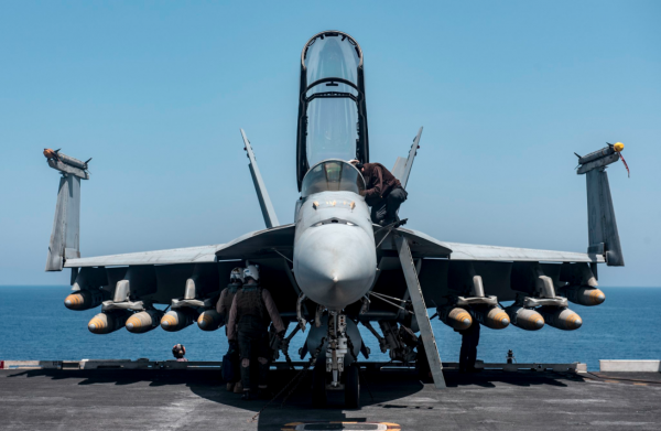 An F-18 aboard the USS George H.W. Bush showing its air-to-ground heavy loadout. DoD photo 