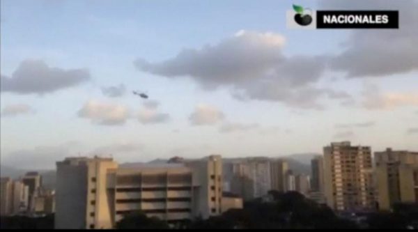 A police helicopter flies over Venezuela's Supreme Court building in Caracas June 27, 2017, in this still image taken from a video. Mandatory credit Caraota Digital - MUST COURTESY CARAOTA DIGITAL/Handout via REUTERS