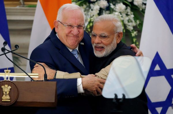 FILE PHOTO: Israeli President Reuven Rivlin (L) and India's Prime Minister Narendra Modi hug each other after reading their joint statement at Hyderabad House in New Delhi, India, November 15, 2016. REUTERS/Adnan Abidi/File Photo