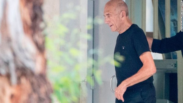File photo of former Israeli prime minister Ehud Olmert shows him getting out of jail in July 2017