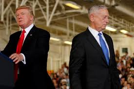 FILE PHOTO: U.S. President Donald Trump (L) is introduced by Defense Secretary James Mattis (R) during the commissioning ceremony of the aircraft carrier USS Gerald R. Ford at Naval Station Norfolk in Norfolk, Virginia, U.S. on July 22, 2017.