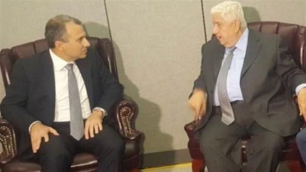 Lebanese Foreign Minister Jebran Bassil is shown with his Syrian counterpart Walid al-Muallem in New York. His meeting has deepened divisions among Lebanon’s politicians 