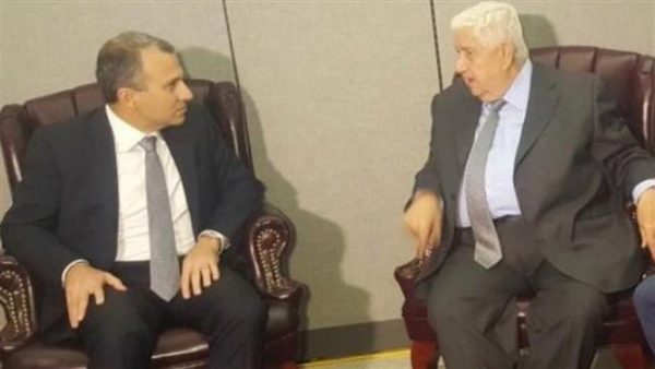 Lebanese Foreign Minister Jebran Bassil is shown with his Syrian counterpart Walid al-Muallem in New York. His meeting  has deepened divisions among Lebanon’s politicians 