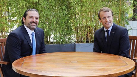 French President Emmanuel Macron (R) emphasized Friday that France will continue to stand by Lebanon following talks in Paris with Prime Minister Saad Hariri (L) 