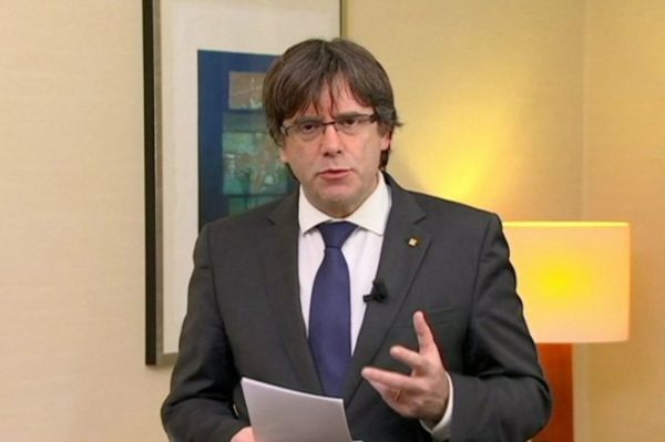 Sacked Catalan leader Puigdemont, four others surrender to Belgian police