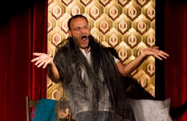 Ziad Itani is shown performing in the “Beirut… Al-Tariq al-Jadideh” play