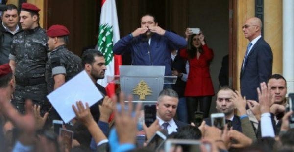  Lebanese Prime Minister Saad Hariri greets his supporters upon his arrival at his home in Beirut on November 22, 2017 after nearly three weeks of absence during which he announced his shock resignation from Saudi Arabia
