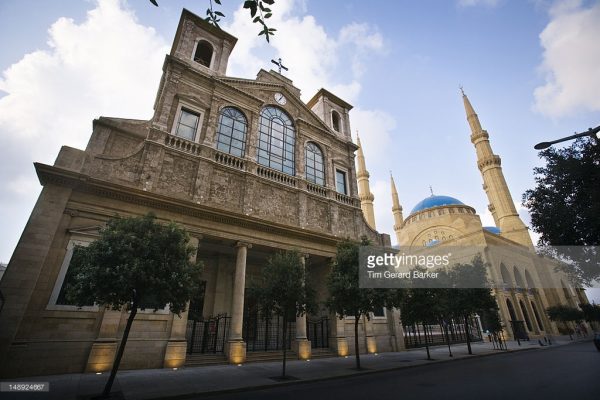 Symbols of coexistence in Lebanon ..St George's Cathedral stands next to the Mohammed al-Amin Mosque. Beirut,  Lebanon,  