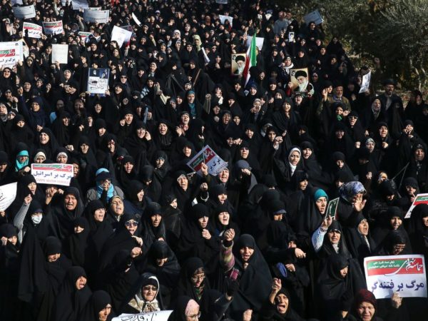 Iranian protesters chant slogans at a rally in Tehran, Iran, Saturday, Dec. 30, 2017. Iranian hard-liners rallied Saturday to support the country's supreme leader and clerically overseen government as spontaneous protests sparked by anger over the co