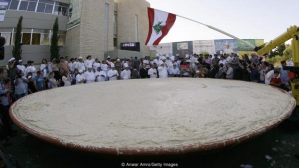 Lebanon holds the Guinness Book of World Records for largest plate of hummus, weighing 10,452kg (Credit: Anwar Amro/Getty Images)