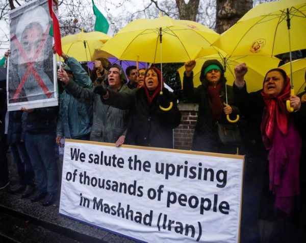 Opponents of Iranian President Hassan Rouhani hold a protest outside the Iranian embassy in west London, Britain December 31, 2017.  REUTERS/Eddie Keogh