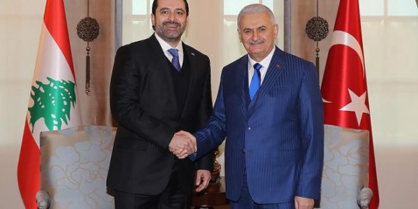 Turkish Prime Minister Binali Yildirim (R) is shown with  visiting Lebanese Prime Minister Saad al-Hariri in Ankara