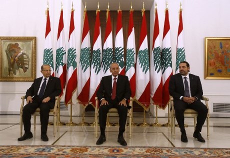 Lebanese prime minister Saad Hariri (R) meets President Michel Aoun (L) and Parliament speaker Nabih Berri(C) at the presidential palace in Baadba on November 22, 2017. 