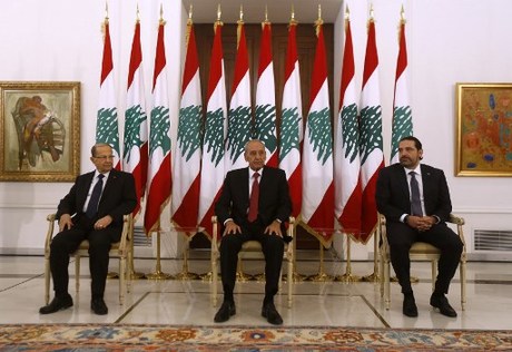 Lebanese prime minister Saad Hariri (R) meets President Michel Aoun (L) and Parliament  speaker Nabih Berri(C) at the presidential palace in Baadba on November 22, 2017.  