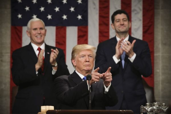 President Trump delivers the State of the Union address as Vice President Mike Pence (left) and Speaker of the House Rep. Paul Ryan (R-WI) look on. Win McNamee/Getty Images
