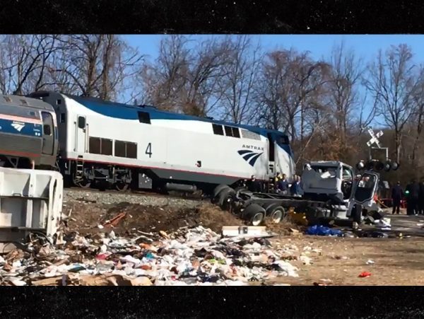 An Amtrak train carrying Republican members of Congress to a retreat smashed into a garbage truck Wednesday morning in Virginia. 