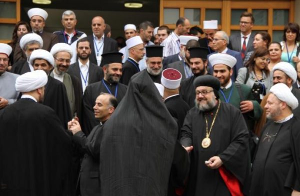In this 2013 file photo, interreligious leaders gather in Beirut for Adyan Foundation's launch of their first toolkit for faith-based educational institutions on values of citizenship and public life. (Credit: CNS photo/courtesy Adyan Foundation.)