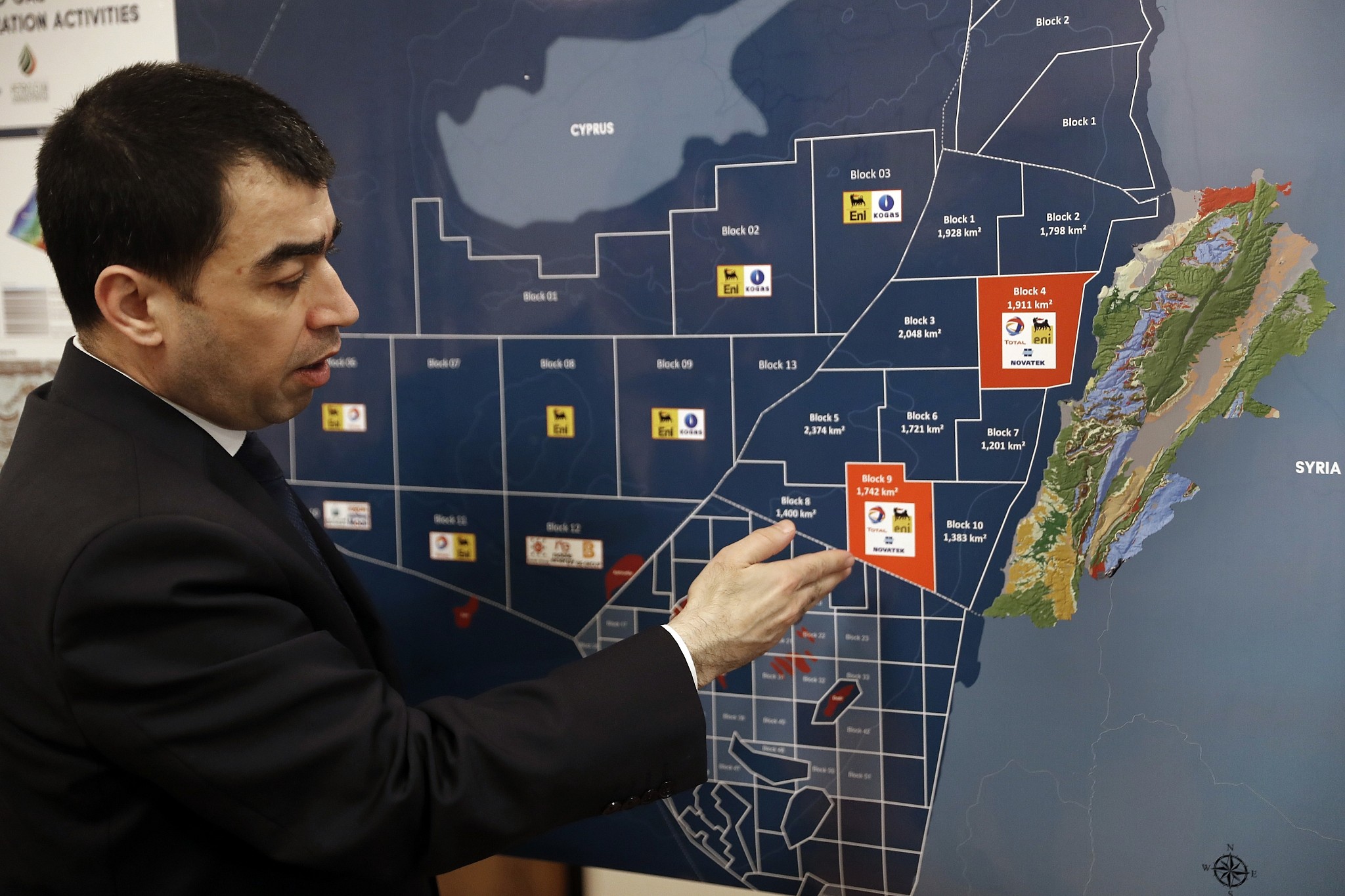 Lebanon's Energy Minister Cesar Abi Khalil, explains on the map about the offshore block 9 which Israel claims, during an interview with the Associated Press at his office, in Beirut, Lebanon, February 1, 2018. (Hussein Malla/AP)