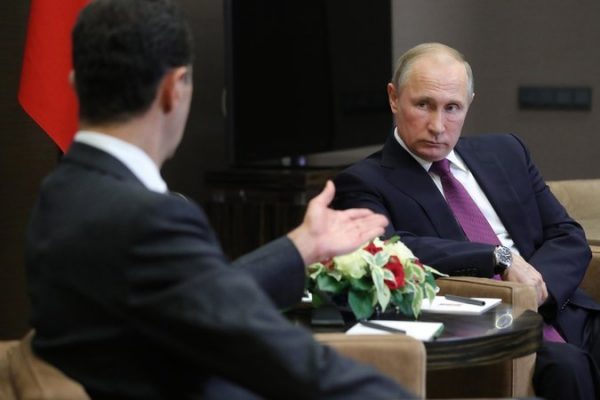 President Bashar al-Assad of Syria, left, and President Vladimir V. Putin of Russia in Aleppo, Syria.  CreditHassan Ammar/Associated Press 