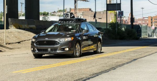  Angelo Merendino / AFP | In this file photo taken on September 13, 2016 a pilot model of an Uber self-driving car travels in Pittsburgh, Pennsylvania.