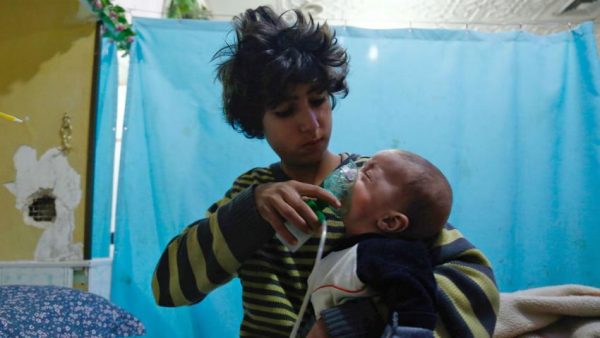 A Syrian rebel group accused government forces on Saturday of launching a deadly chemical attack on civilians in a rebel-held town in eastern Ghouta, and a medical relief organization said 35 people had been killed in chemical attacks on the area.