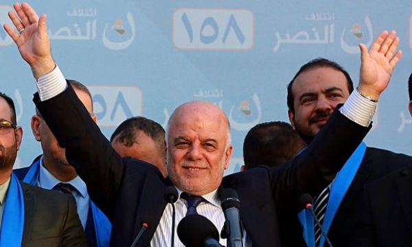 The Iraqi prime minister, Haider al-Abadi, speaks at a campaign rally in Baghdad. Photograph: Hadi Mizban/AP