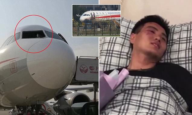 Sichuan Airlines Pilot lands plane after co-pilot 'gets sucked out of cockpit window' 