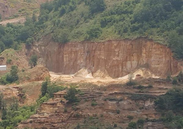 A quarry cuts into an entire hill in the Lebanese mountains at Tarshish (Nelofer Pazira) ( )