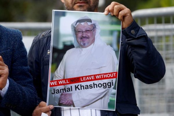 A demonstrator holds picture of Khashoggi during a protest in front of Saudi Arabia's consulate in Istanbul, Turkey.PHOTO: REUTERS