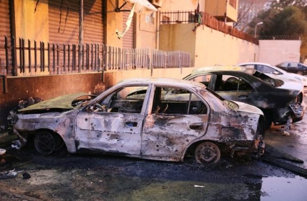 Burned cars are seen at the site of the headquarters of Libya's Foreign Ministry after suicide attackers hit in Tripoli, Libya December 25, 2018. REUTERS/Hani Amara