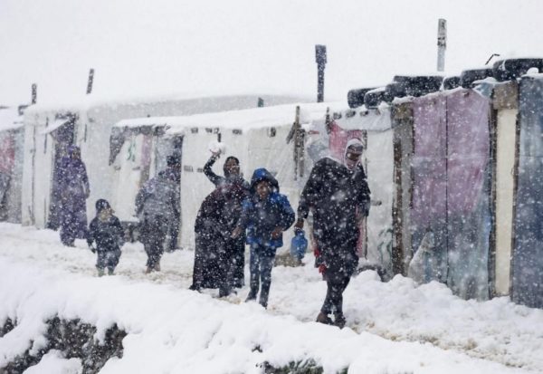 Syrian refugees snow in Lebanon