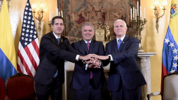 Colombian Presidency, AFP | Colombian President Ivan Duque (C), US Vice President Mike Pence (R) and Venezuelan self-declared acting president Juan Guaido at Colombia's Foreign Affairs Ministry in Bogota on February 25, 2019.
