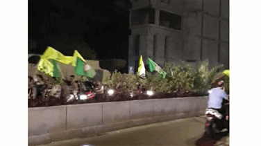 Hezbollah amal supports roam beirut streets over motorbikes