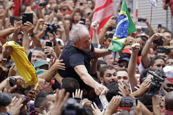 The former president of Brazil, Luiz Inácio Lula da Silva, is carried by his supporters on Nov. 9, 2019, in Brazil. (AP Foto/Nelson Antoine)