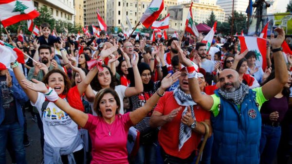 Anti-government protesters chant slogans against the Lebanese government, in Beirut, Lebanon, Sunday, Nov. 3, 2019. President Michel Aoun and his son-in-law, Foreign Minister Gebran Bassil, have been among the main targets of mass protests that aim to sweep from power Lebanon's entire sectarian and political elite. BILAL HUSSEIN  AP PHOTO Read more here: https://www.miamiherald.com/news/nation-world/article236965113.html#storylink=cpy