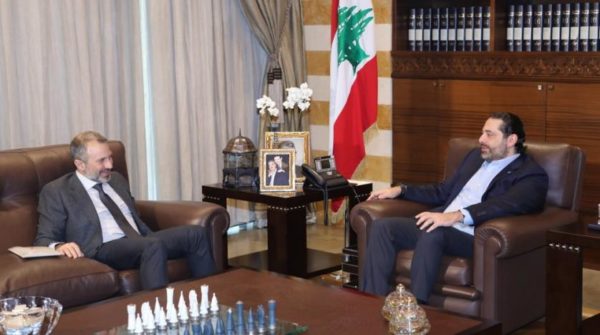 Lebanese caretaker PM Saad Hariri (R) receives caretaker Foreign Minister Gebran Bassil at the Center House in Beirut. (NNA file photo)