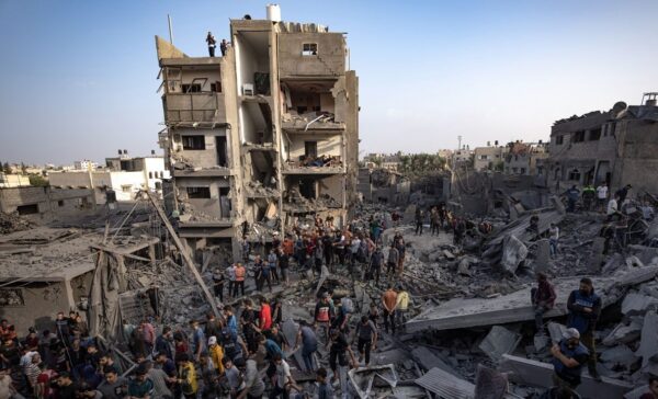 Israel bombs 2 Gaza refugee camps, encircles the strip and divides it into two