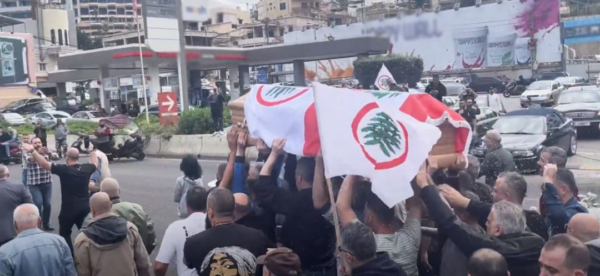 Thousands bid farewell to Lebanese Forces official amid sectarian tension and anti-Syria sentiment  in Lebanon