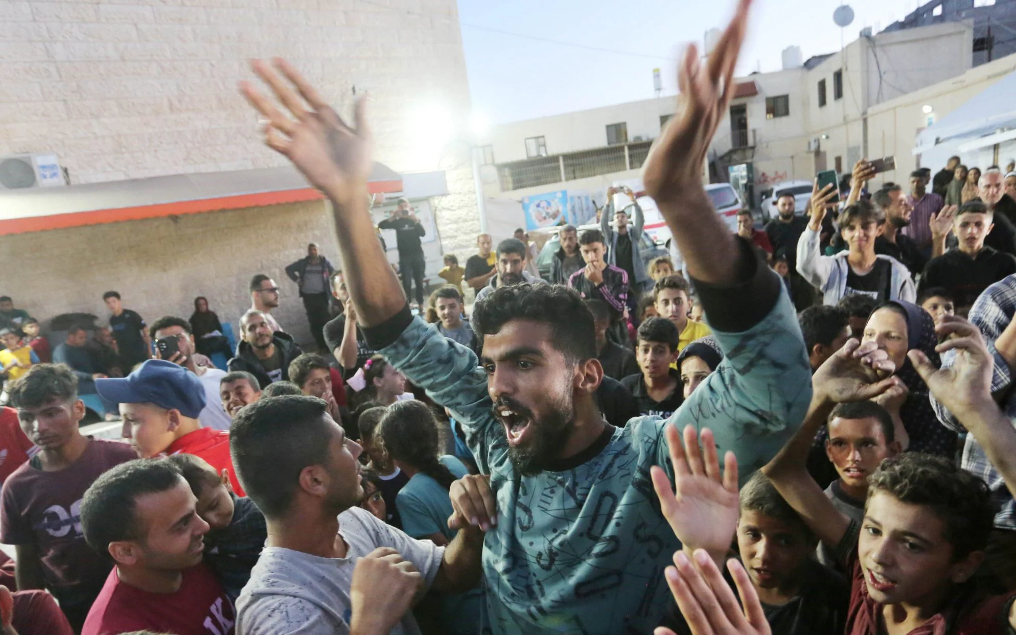 Gazans celebrate after Hamas approves truce plan