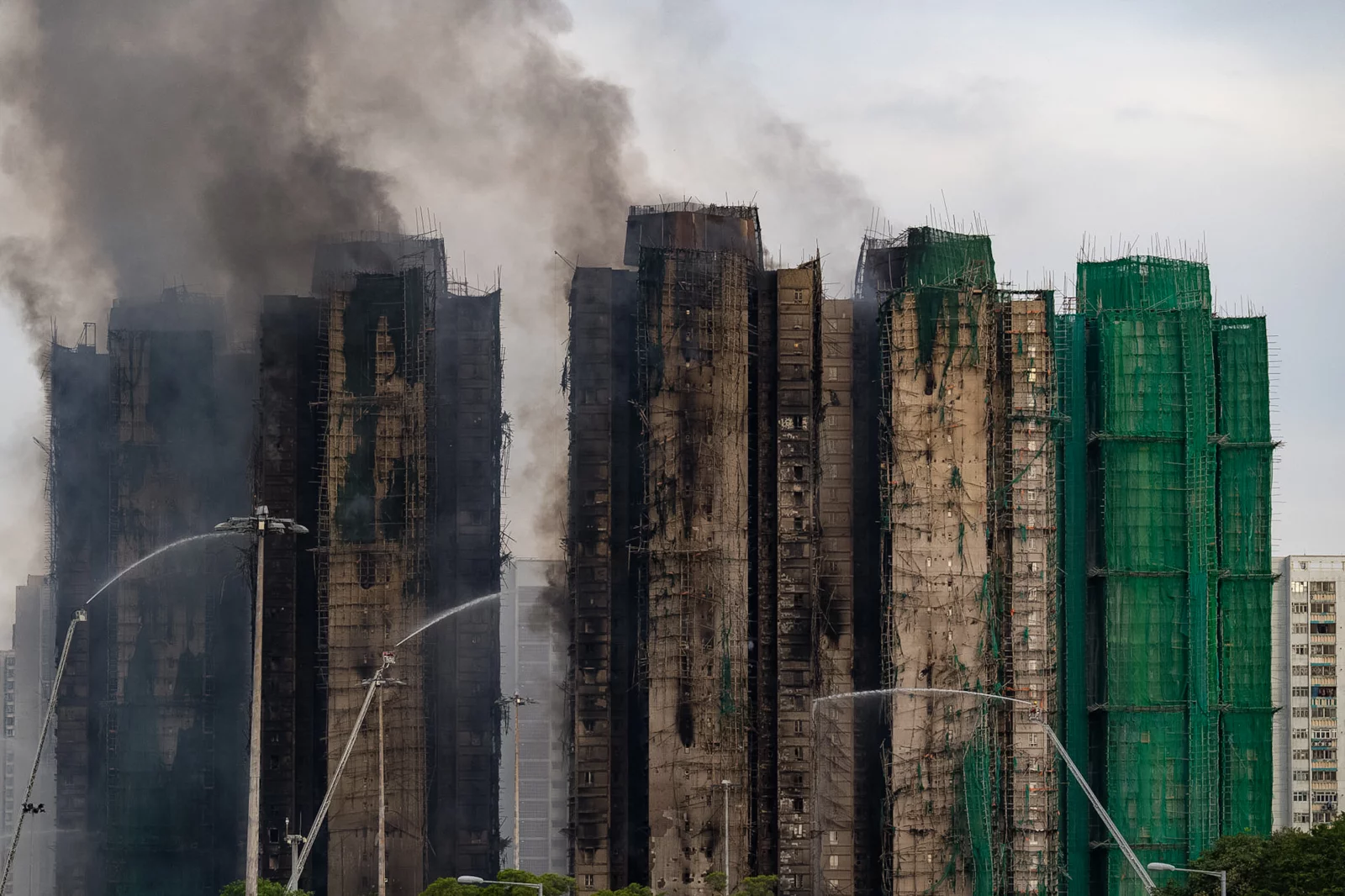 Death toll in Hong Kong high-rise fire rises to 128, with dozens still missing