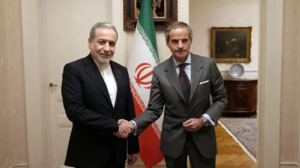 Iran FM meets head of  UN nuclear watchdog ahead of U.S. talks