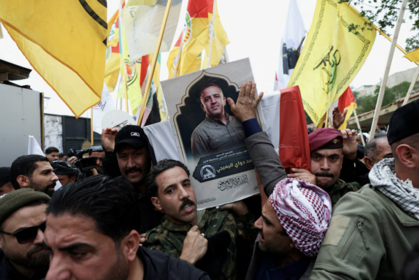 Airstrikes target HQ and leader of Iran-backed Shi’ite militia umbrella group in Iraq